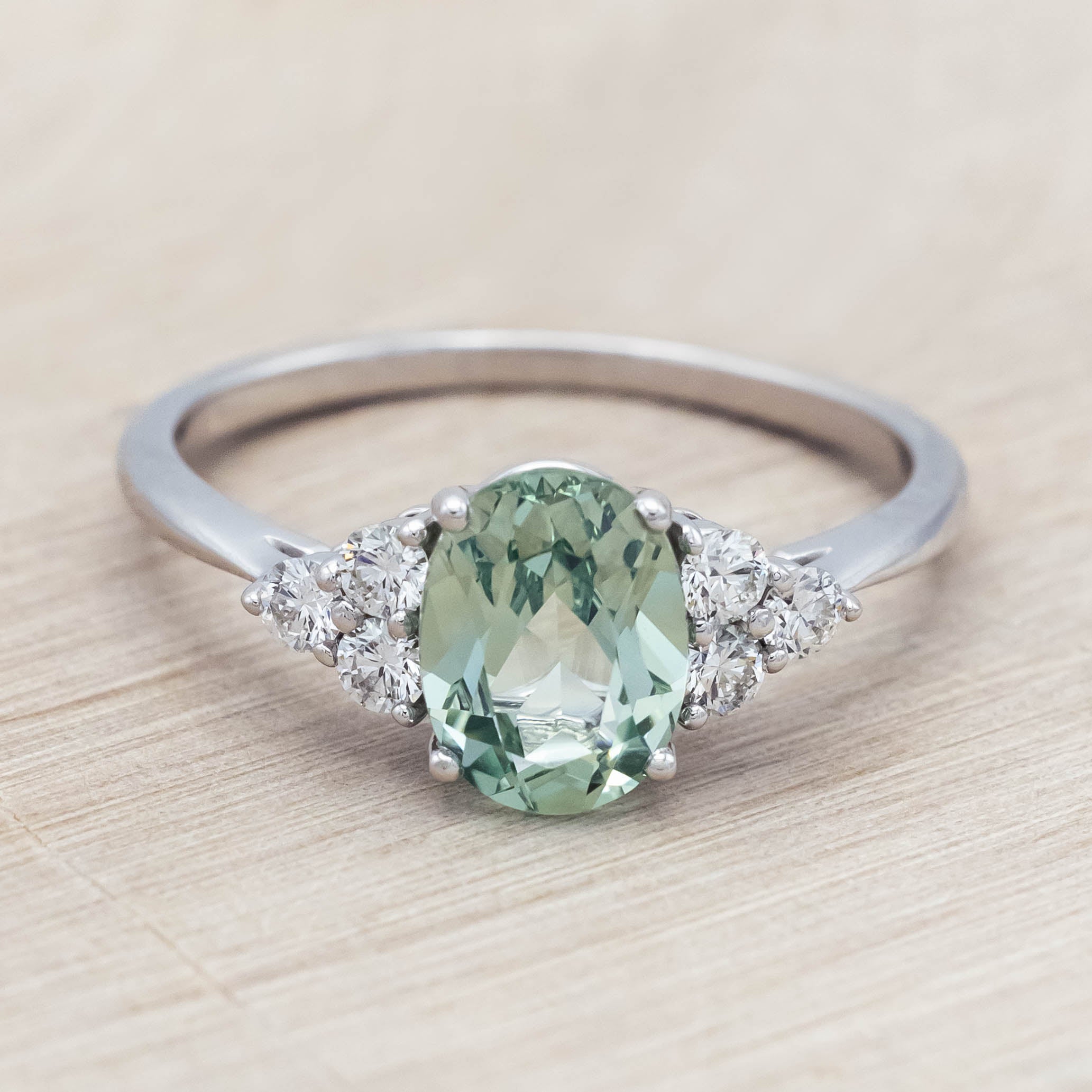 "RHEA" - OVAL CUT LAB-GROWN GREEN SAPPHIRE ENGAGEMENT RING WITH DIAMOND ACCENTS-Staghead Designs