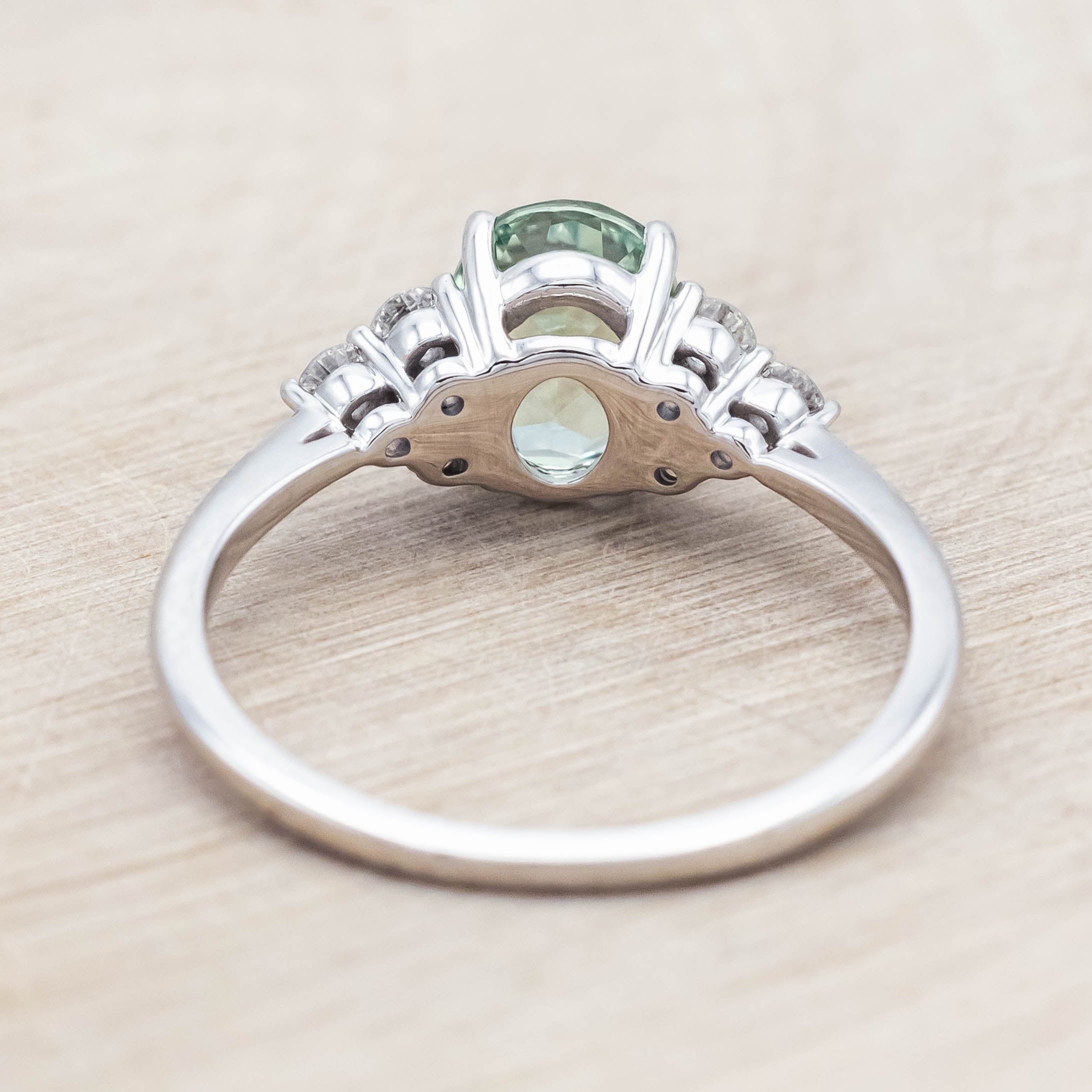 "RHEA" - OVAL CUT LAB-GROWN GREEN SAPPHIRE ENGAGEMENT RING WITH DIAMOND ACCENTS-Staghead Designs