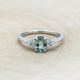 "RHEA" - OVAL LAB-GROWN GREEN SAPPHIRE ENGAGEMENT RING WITH DIAMOND ACCENTS-Staghead Designs