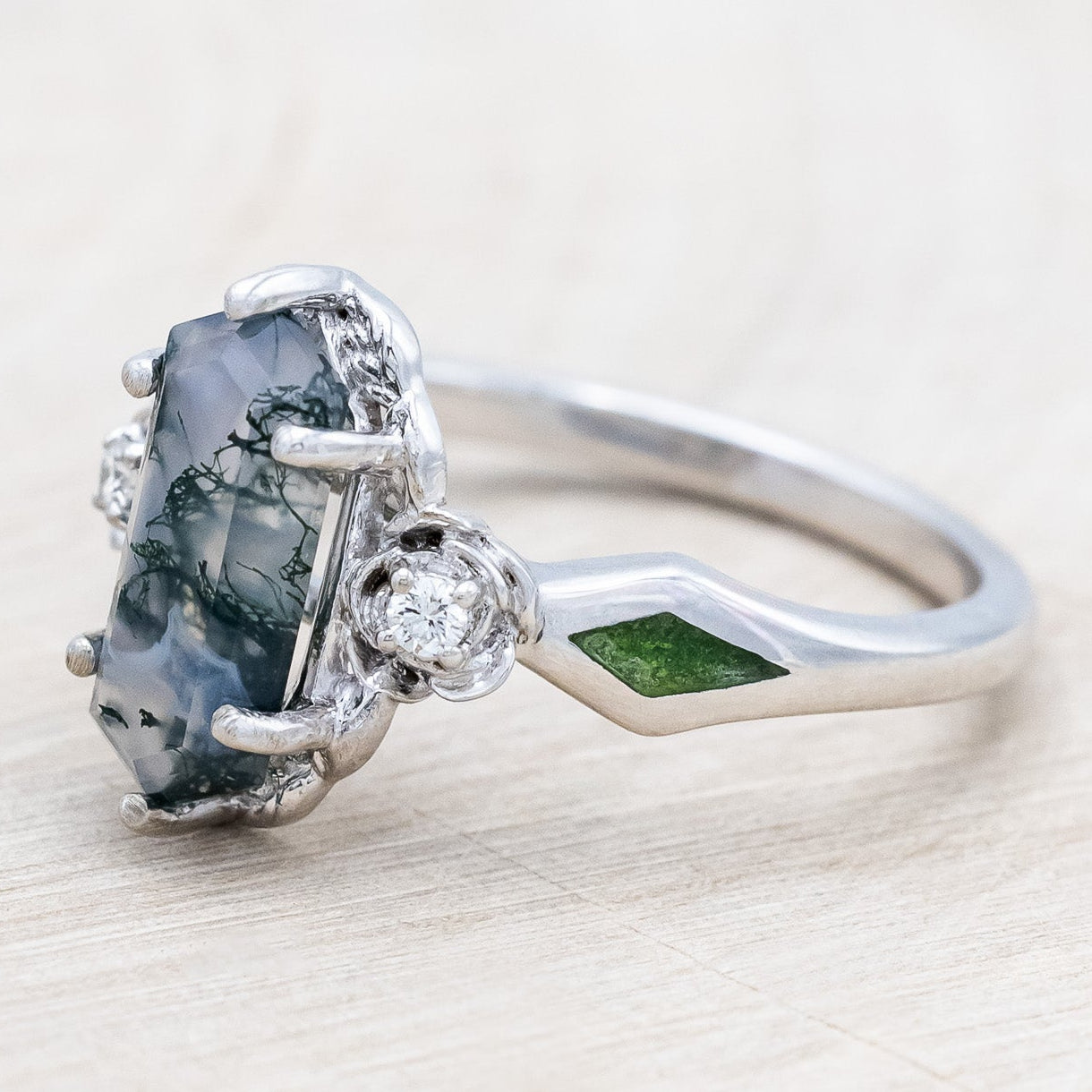 Side view of "Rosetta" - floral-inspired hexagon moss agate women's engagement ring with diamond accents & moss inlays