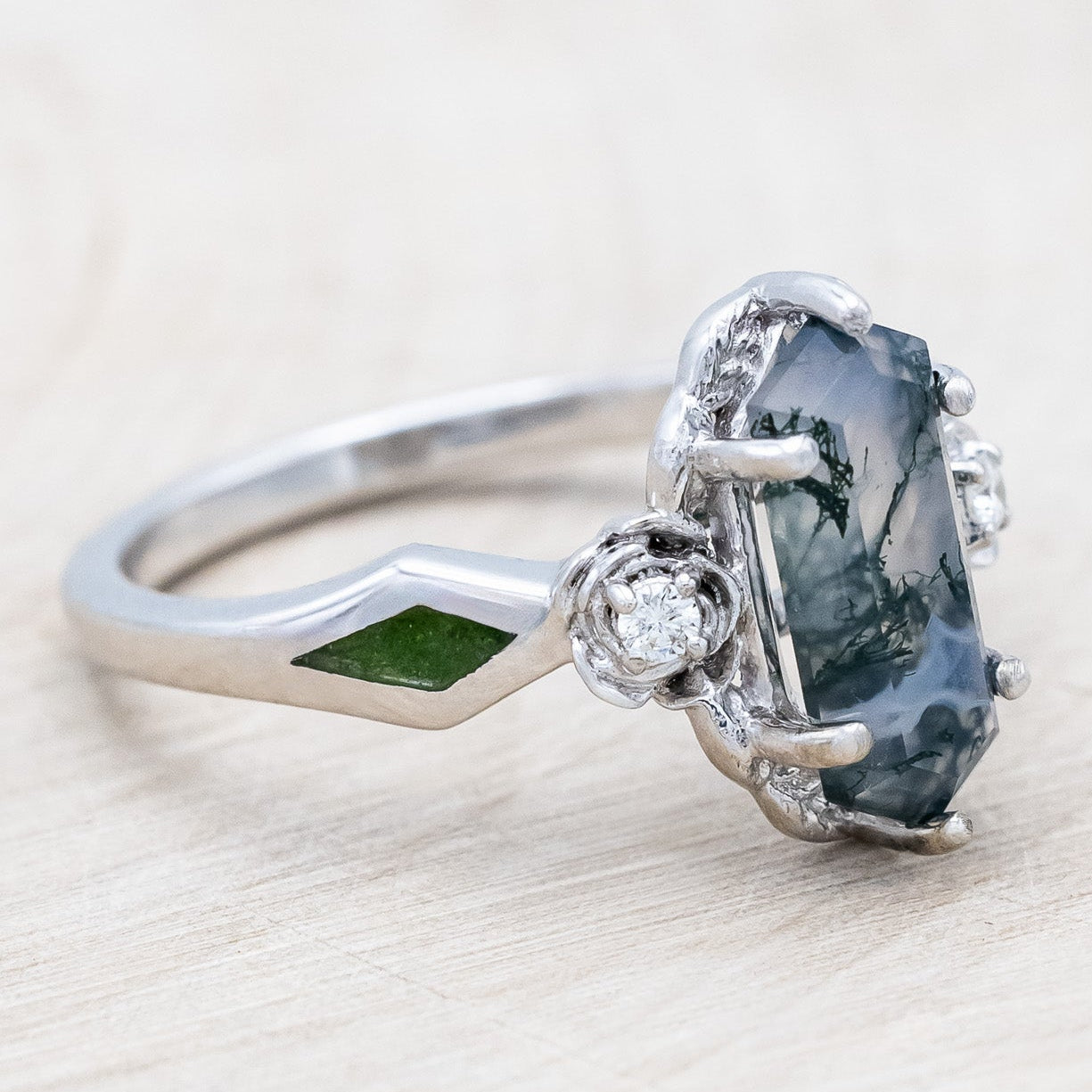 Side view of "Rosetta" - floral-inspired hexagon moss agate women's engagement ring with diamond accents & moss inlays