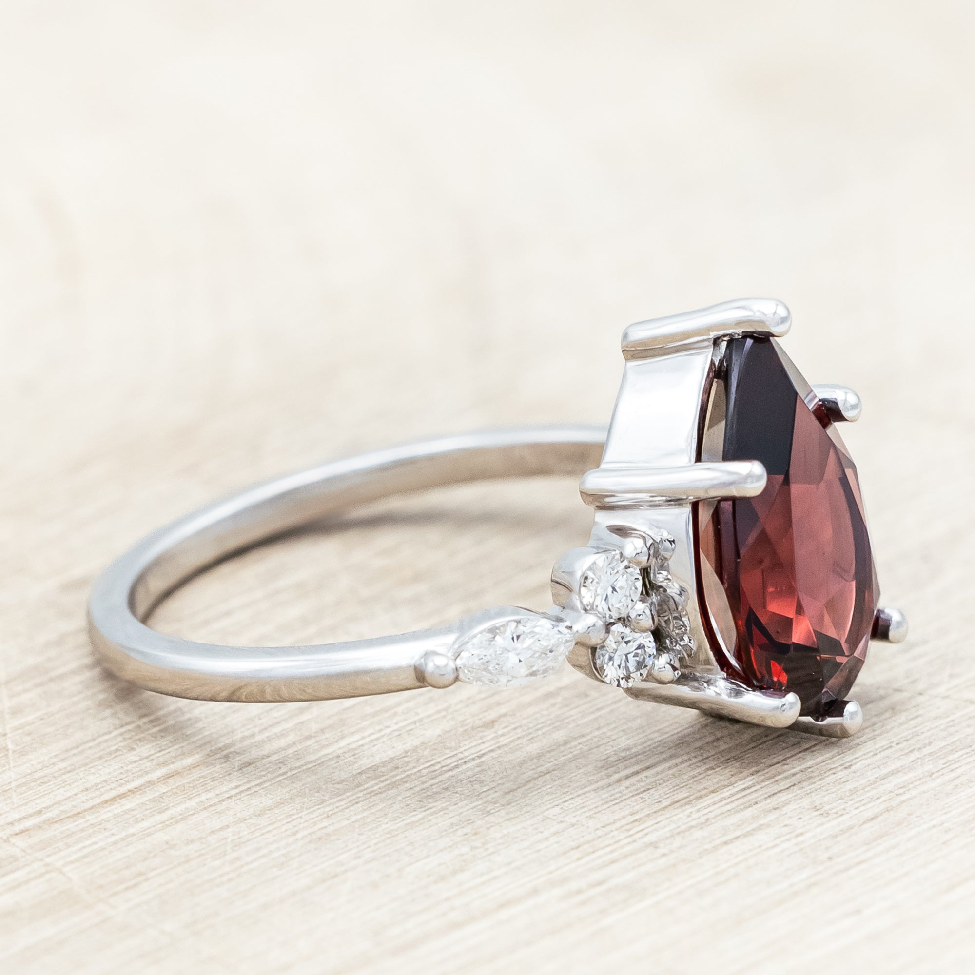 "SAGE" - PEAR CUT MOZAMBIQUE GARNET ENGAGEMENT RING WITH DIAMOND ACCENTS & "FALA" TRACER-Staghead Designs
