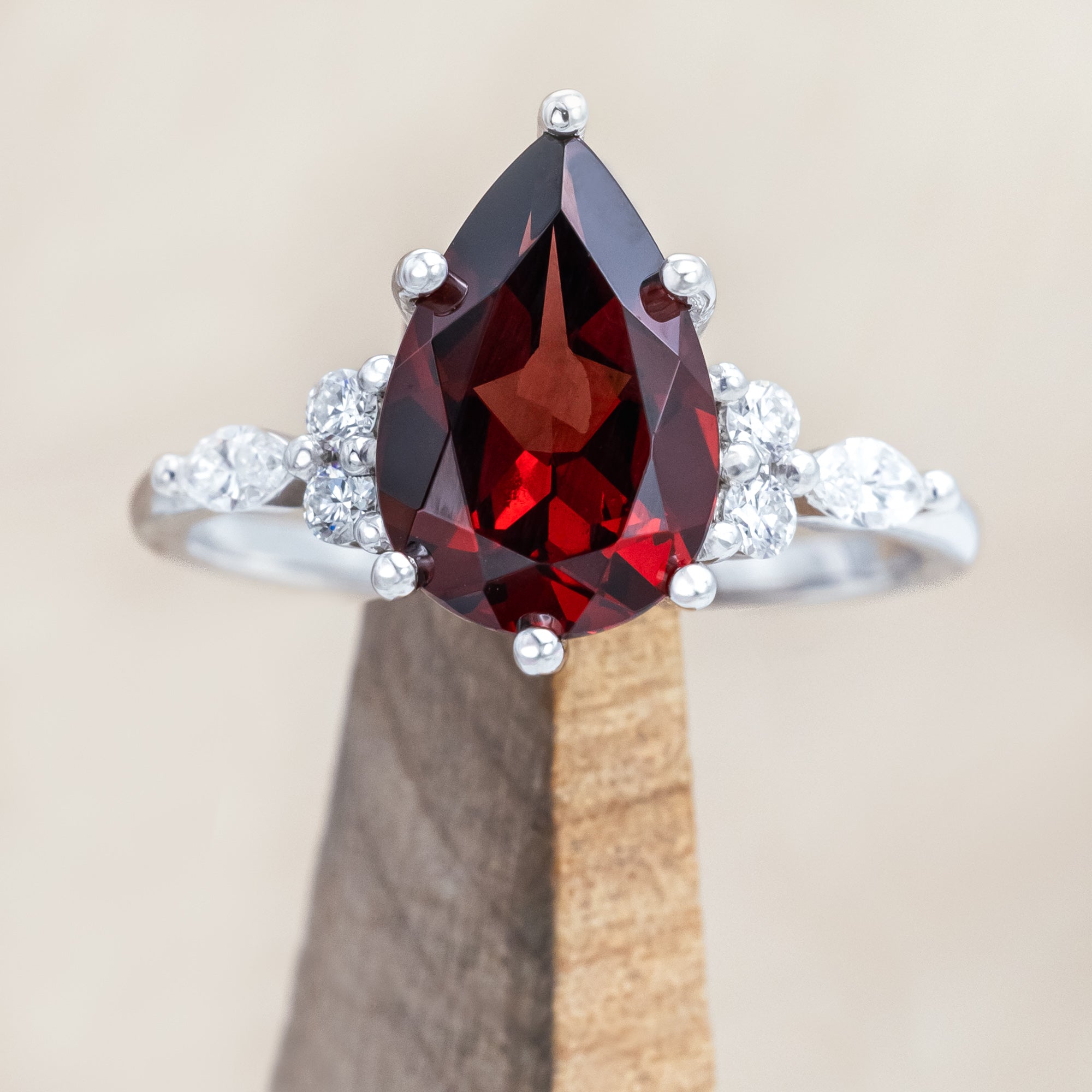 "SAGE" - PEAR CUT MOZAMBIQUE GARNET ENGAGEMENT RING WITH DIAMOND ACCENTS & "FALA" TRACER-Staghead Designs
