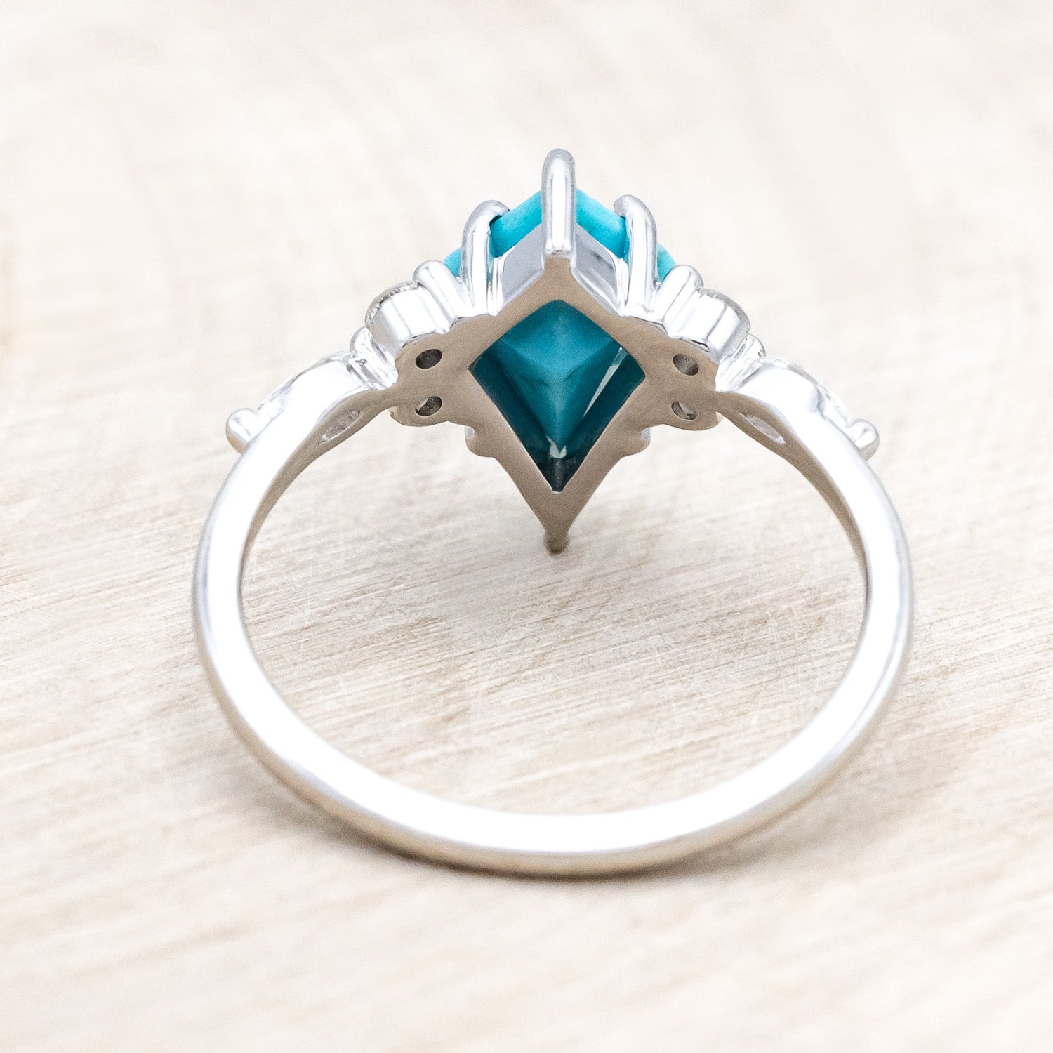 back view of "Sage" - kite-cut stabilized turquoise women's engagement ring with diamond accents
