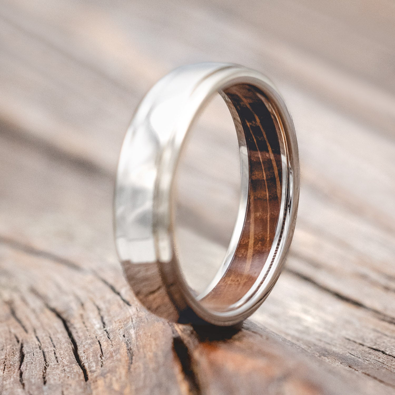 "SEDONA" - RAISED CENTER WEDDING RING FEATURING A WHISKEY BARREL LINED 14K GOLD BAND-Staghead Designs