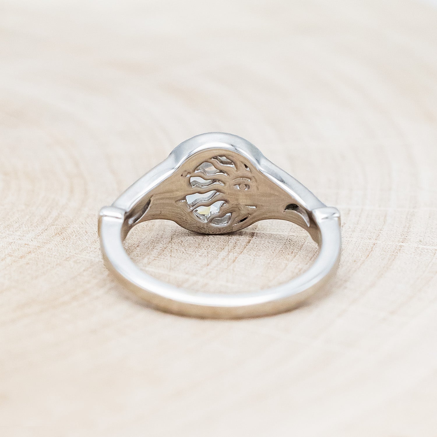 Back view of "Selene" - round lab-grown diamond women's engagement ring with crescent moon engravings in 14K white gold