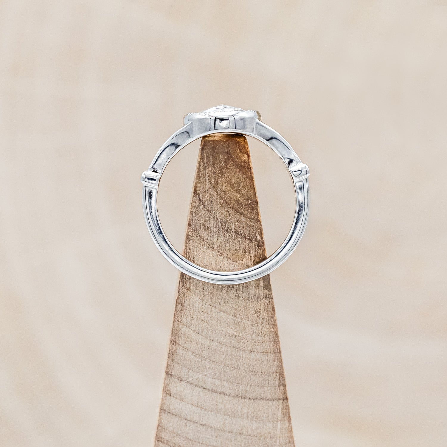 Top view of "Selene" - round lab-grown diamond women's engagement ring with crescent moon engravings in 14K white gold