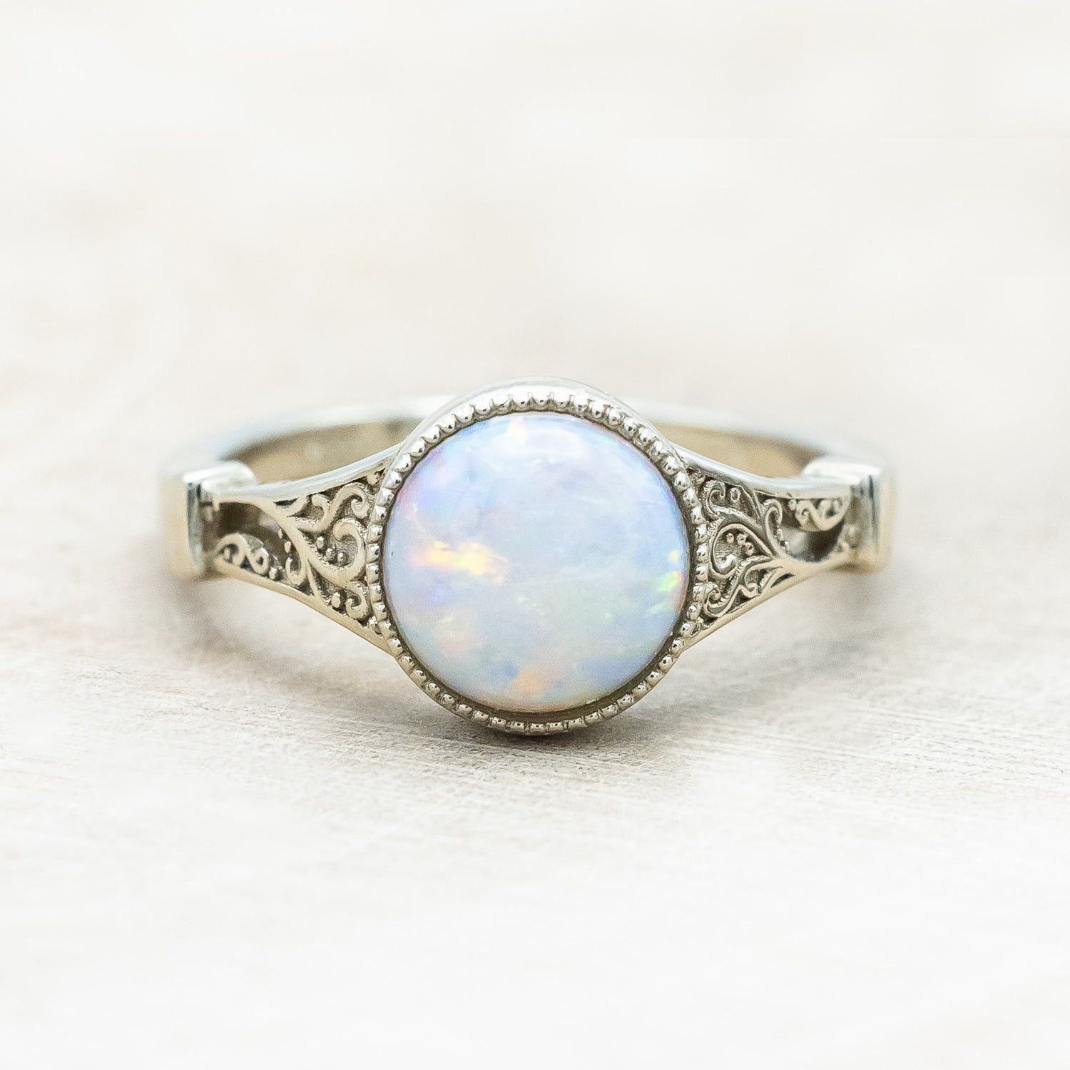 "Selene"  - Australian opal women's engagement ring with crescent moon engravings in 14K white gold