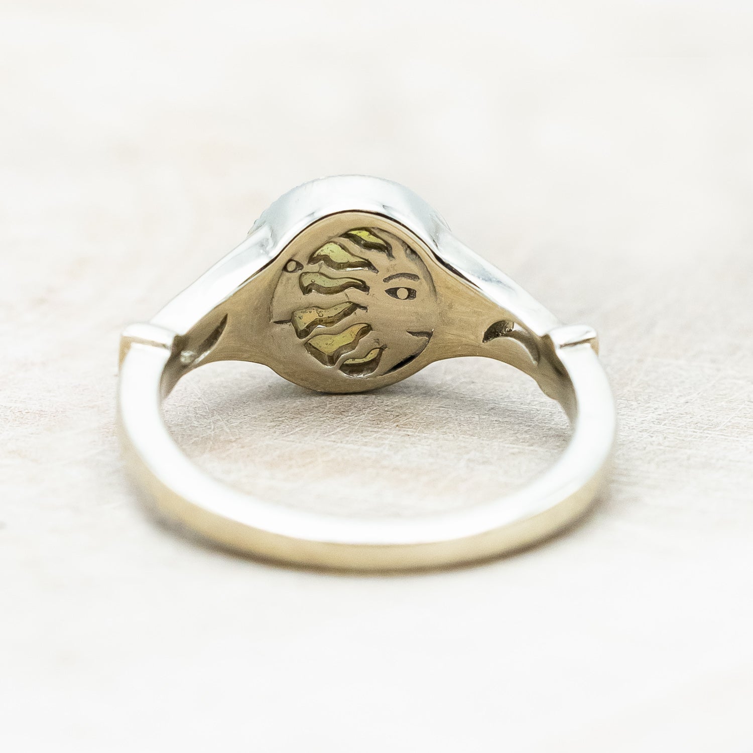 Back view of "Selene"  - Australian opal women's engagement ring with crescent moon engravings in 14K white gold