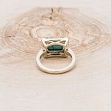 "SIENNA" - EMERALD CUT TURQUOISE ENGAGEMENT RING WITH DIAMOND HALO & ACCENTS