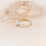 "STARLA" - ROUND CUT OPAL ENGAGEMENT RING WITH STARBURST DIAMOND HALO