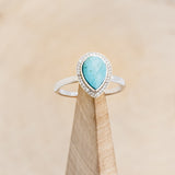 "TERRA" - PEAR-SHAPED TURQUOISE ENGAGEMENT RING WITH DIAMOND HALO