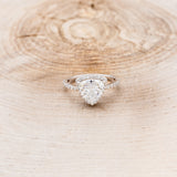 "ELENA" - TRILLION CUT MOISSANITE ENGAGEMENT RING WITH DIAMOND HALO & ACCENTS