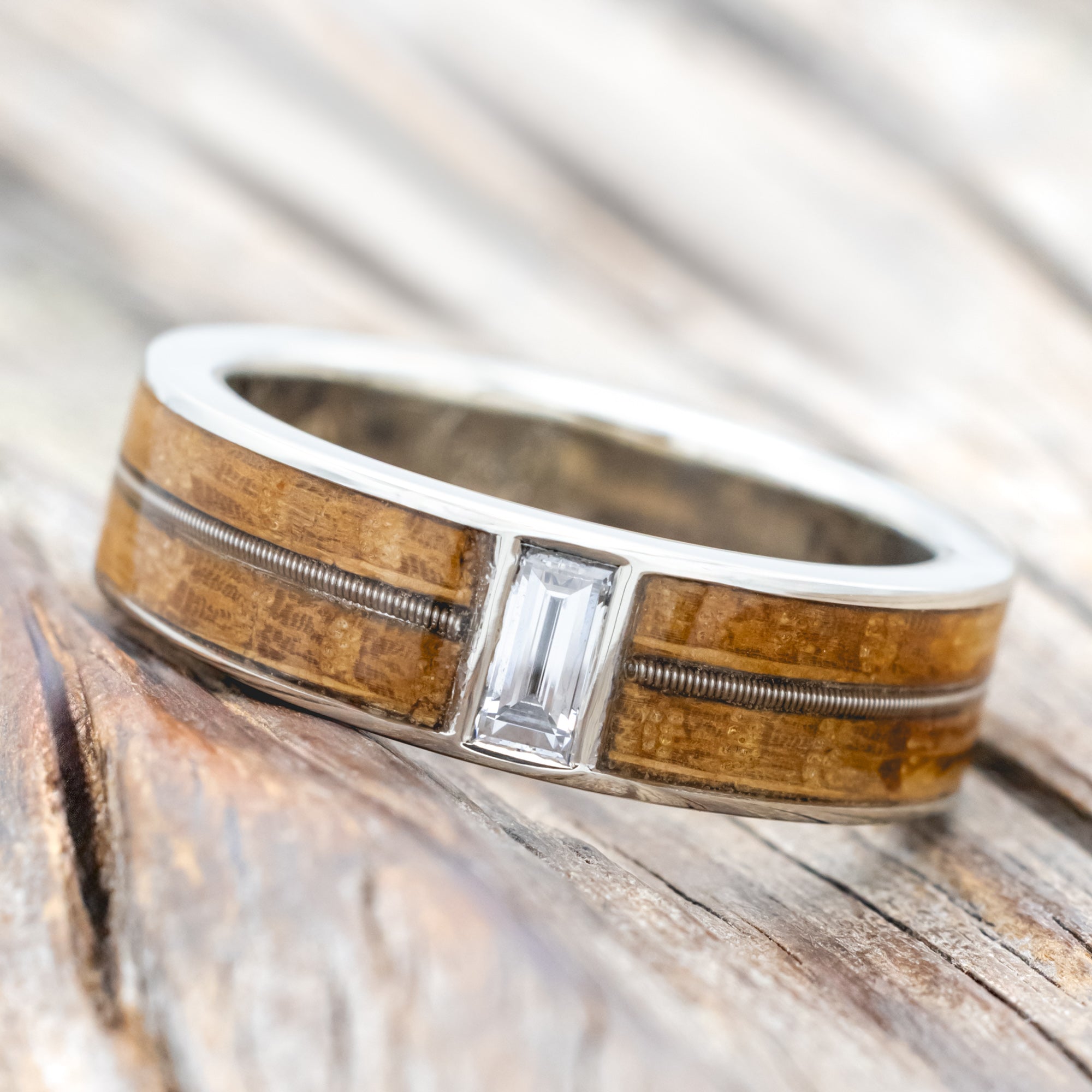 "Vaughan" - Guitar String & Whiskey Barrel Oak Wedding Ring With Lab-Grown Baguette Cut Diamond-Staghead Designs