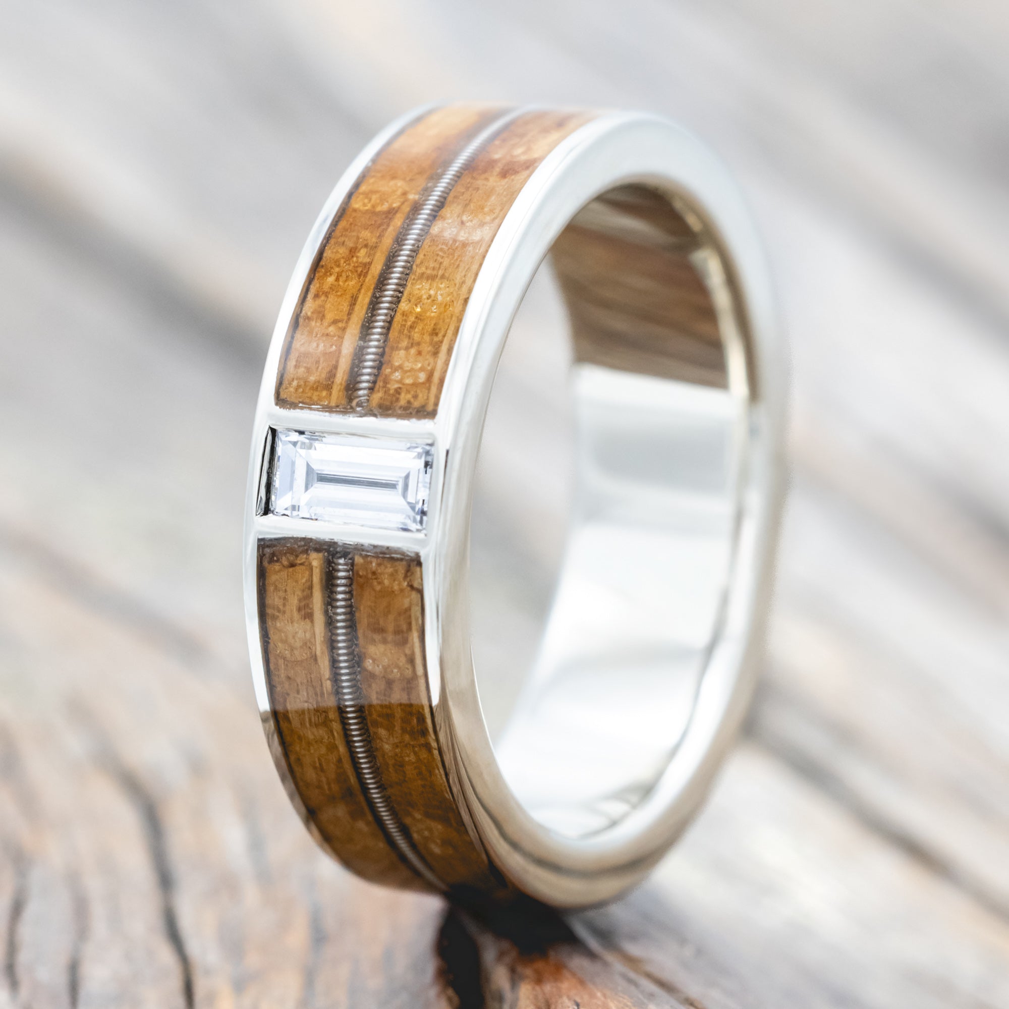 "Vaughan" - Guitar String & Whiskey Barrel Oak Wedding Ring With Lab-Grown Baguette Cut Diamond-Staghead Designs