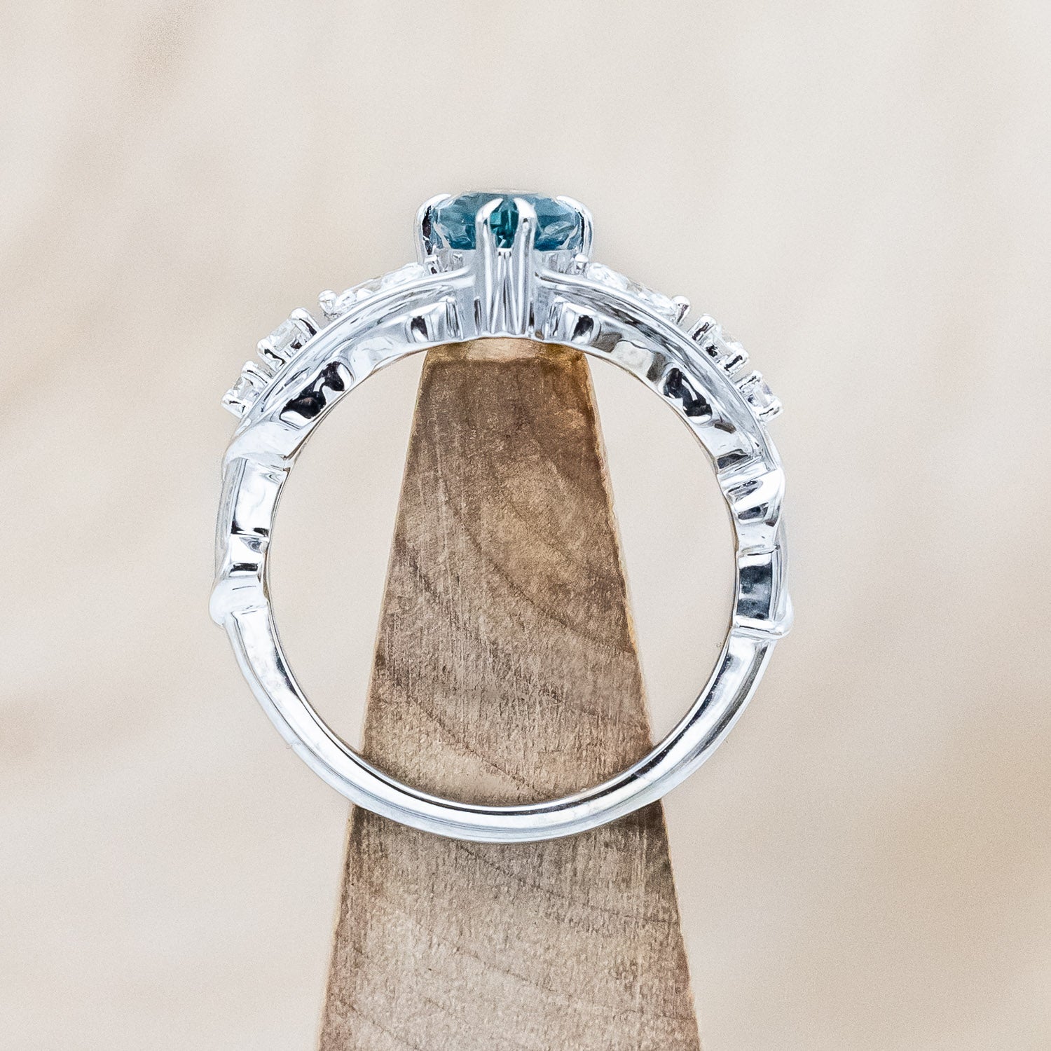 Front view of "Amarie" - diamond accented engagement ring with an abstract filigree cutout