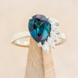 "AMBROSIA" - PEAR-SHAPED LAB-GROWN ALEXANDRITE ENGAGEMENT RING WITH MOISSANITE ACCENTS