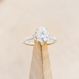"ZELLA" - OVAL MOISSANITE ENGAGEMENT RING WITH DIAMOND ACCENTS