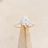 "ZELLA" - OVAL CUT ENGAGEMENT RING WITH DIAMOND ACCENTS