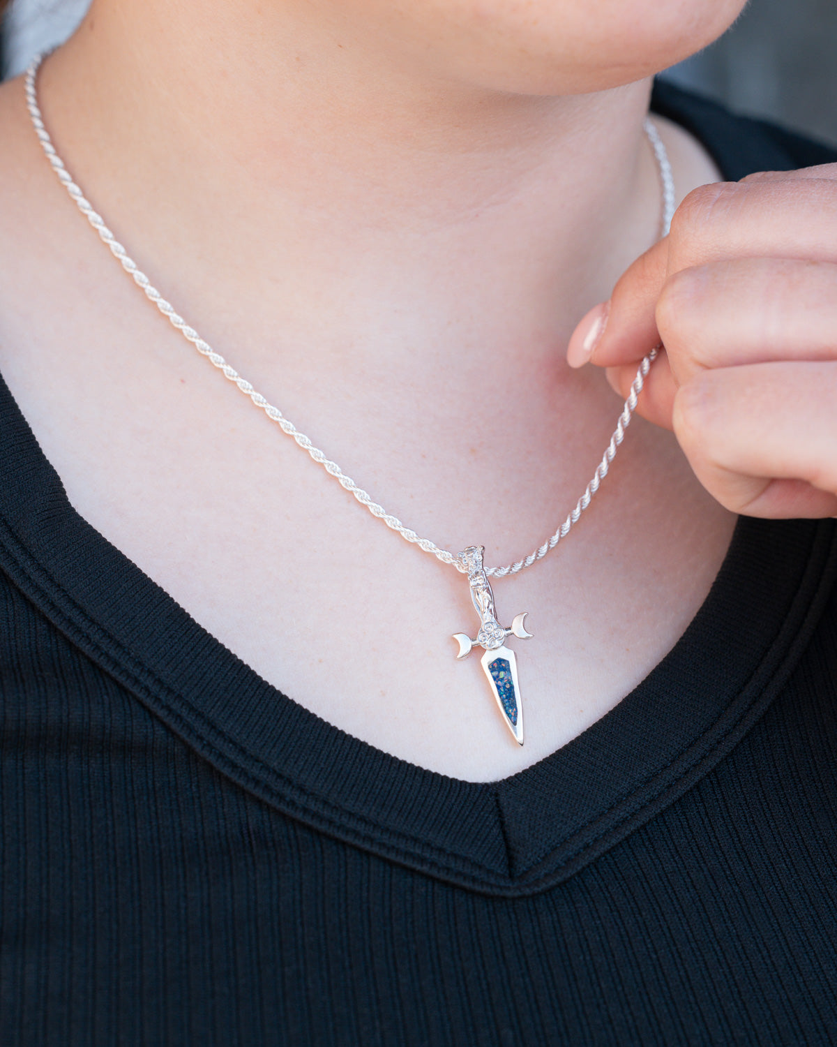 On neck photo of Silver Goddess Dagger Pendant with  Crushed Blue Opal and Lapis Lazuli Mix