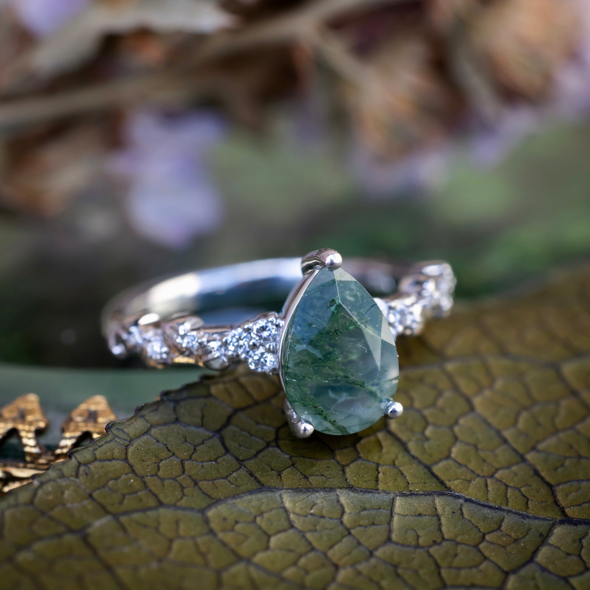 "Lynette" - Pear Cut Moss Agate Engagement Ring With A Leaf Style Band-Staghead Designs