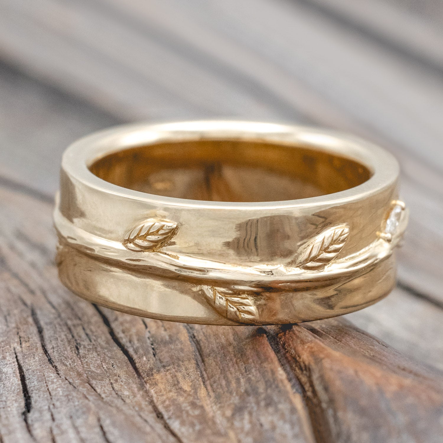 "Alwin" - men's wedding ring with embossed vines wrapping around the band & diamond accents in 14K gold