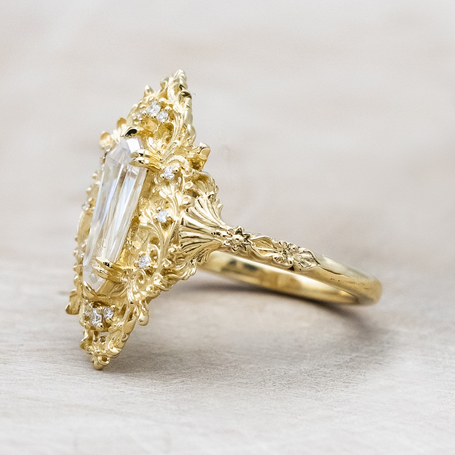 Side view of "Cherie" - rococo-inspired Moissanite women's engagement ring with diamond accents