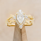 "ARTEMIS ON THE VINE DIVINE" - PEAR MOISSANITE ENGAGEMENT RING WITH DIAMOND ACCENTS & A BRANCH-STYLE BAND-1