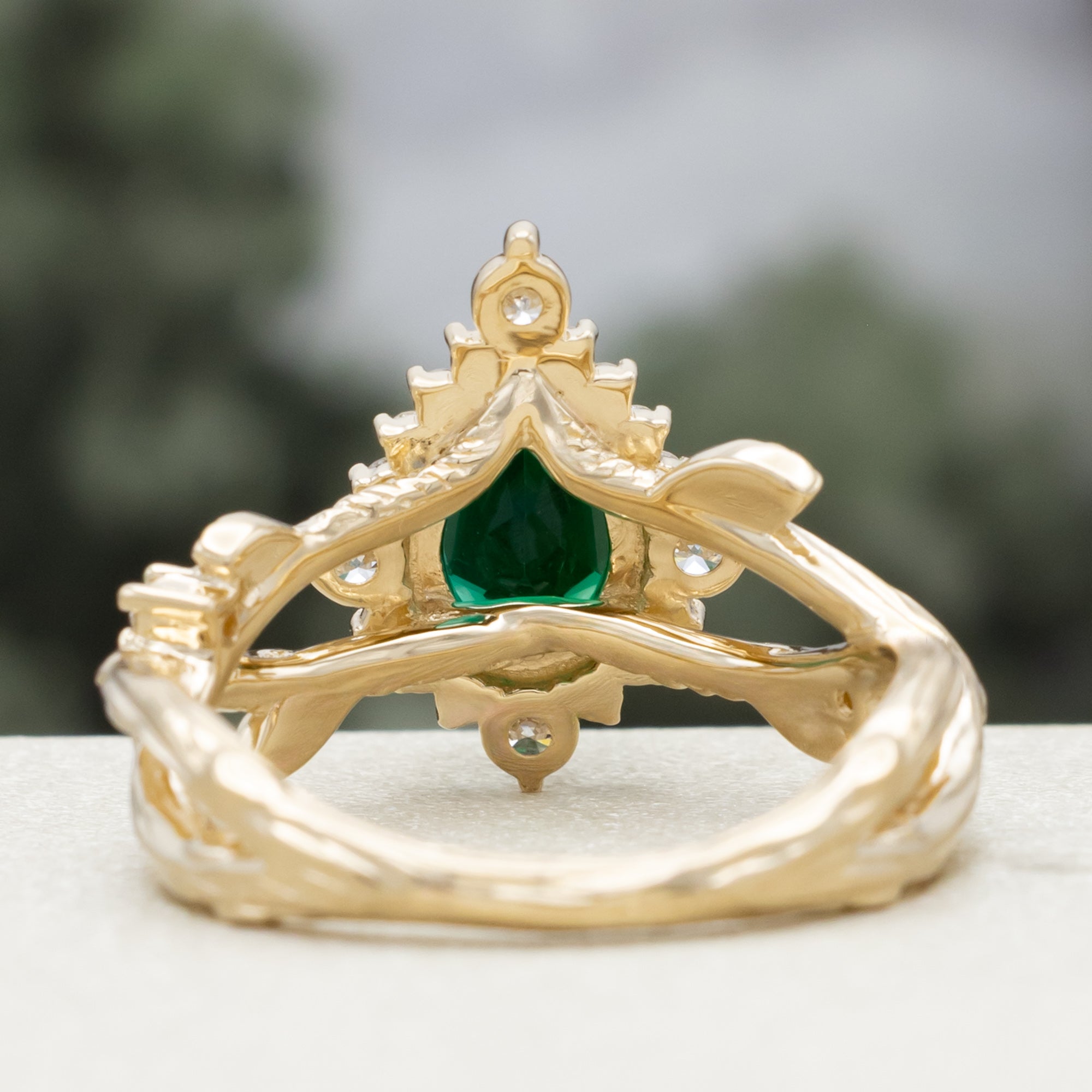 "ARTEMIS ON THE VINE DIVINE" - PEAR CUT LAB-GROWN EMERALD ENGAGEMENT RING WITH DIAMOND ACCENTS & A BRANCH-STYLE BAND-Staghead Designs