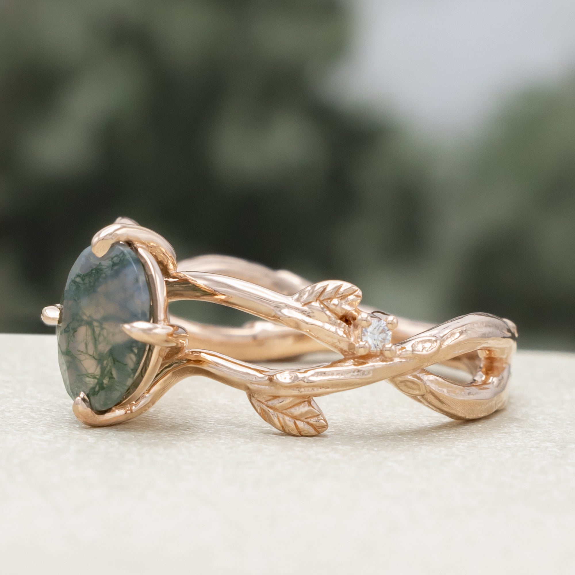 "Artemis On The Vine" - Oval Cut Moss Agate Engagement Ring With Diamond Accents & A Branch-Style Band-Staghead Designs