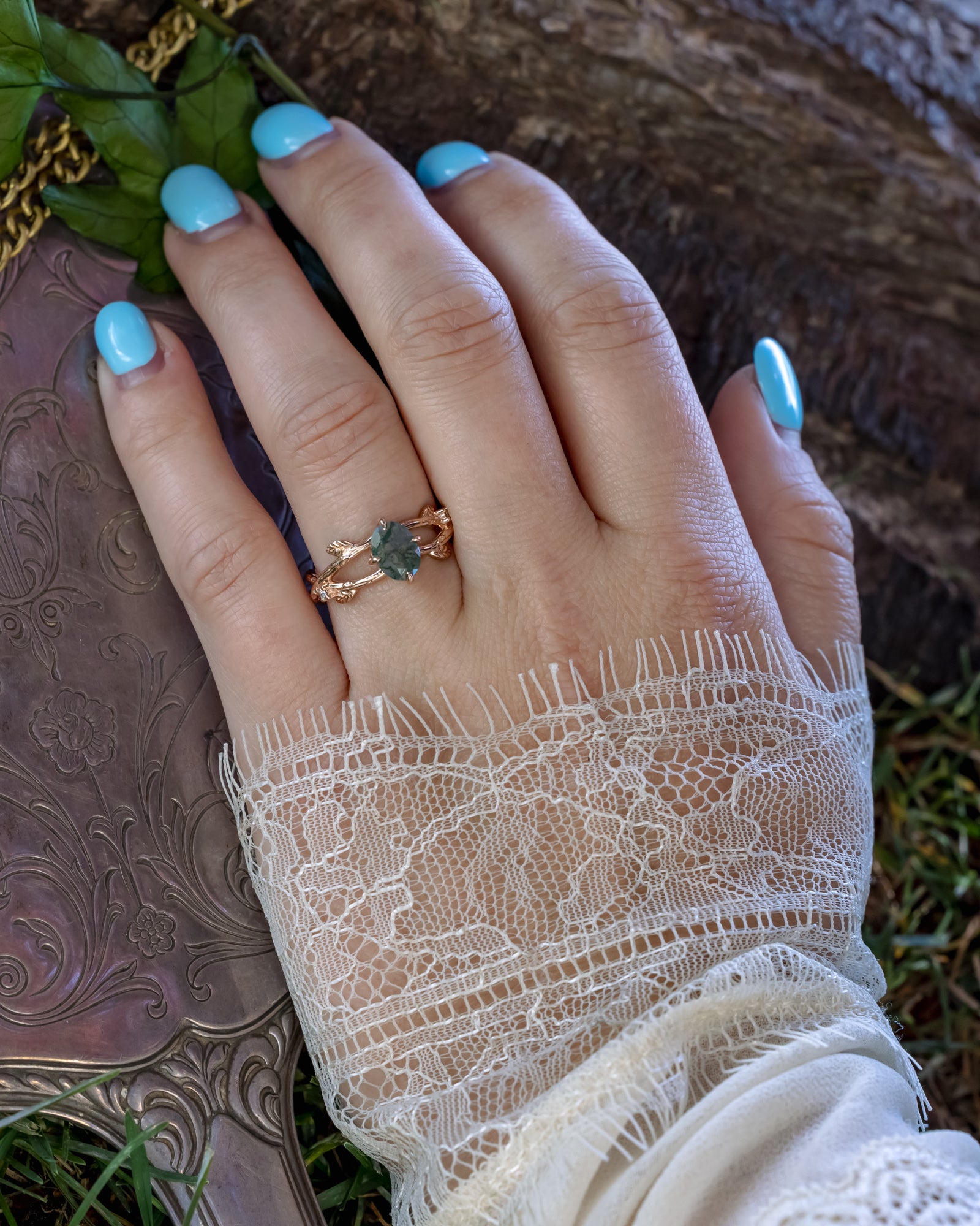 "Artemis On The Vine" - Oval Cut Moss Agate Engagement Ring With Diamond Accents & A Branch-Style Band-Staghead Designs