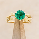 "ARTEMIS ON THE VINE" - HEXAGON LAB-GROWN EMERALD ENGAGEMENT RING WITH DIAMOND ACCENTS & A BRANCH-STYLE BAND