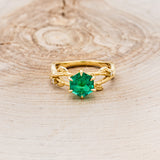 "ARTEMIS ON THE VINE" - HEXAGON LAB-GROWN EMERALD ENGAGEMENT RING WITH DIAMOND ACCENTS & A BRANCH-STYLE BAND
