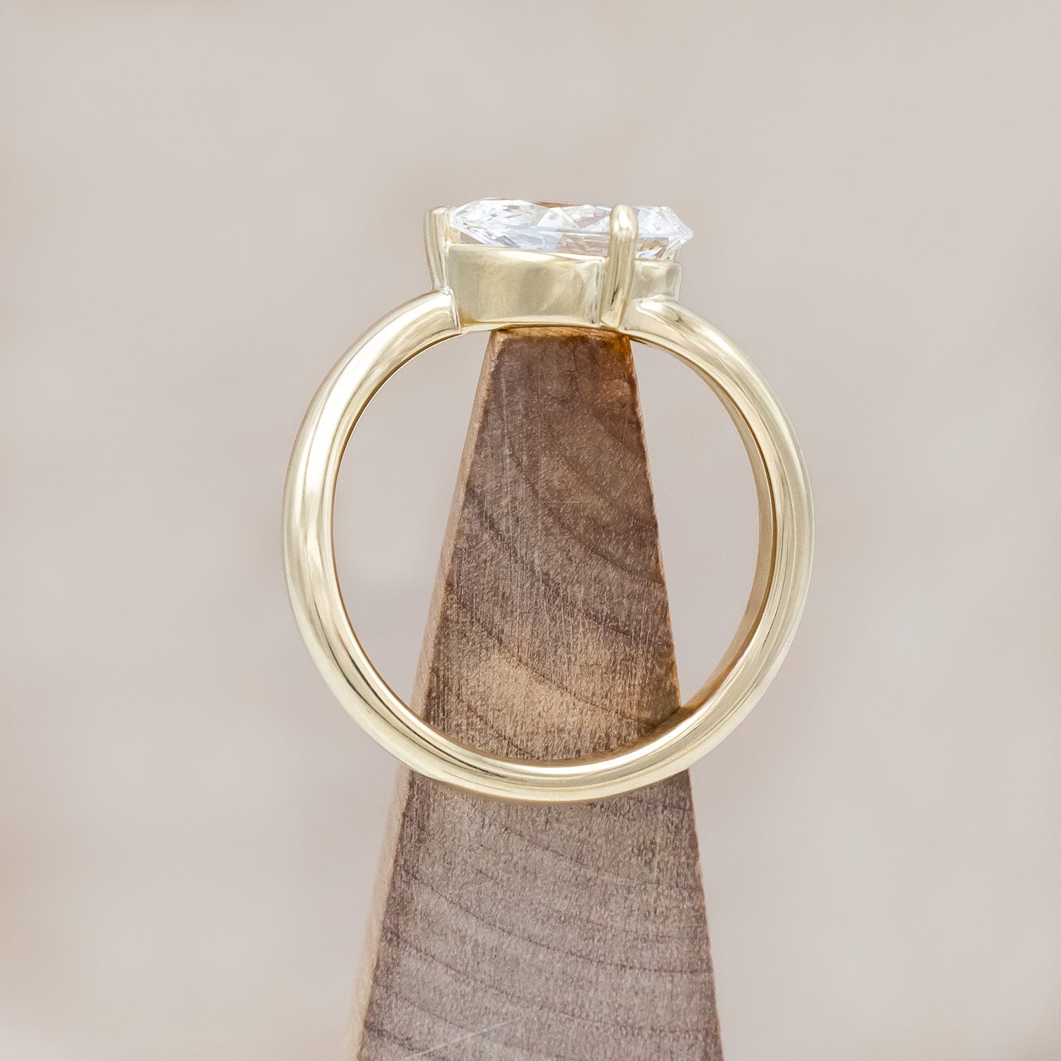 Top view of "Sybil" - asymmetrical solitaire-style lab diamond women's engagement ring