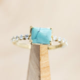 "AZURA" - EMERALD CUT TURQUOISE ENGAGEMENT RING WITH DIAMOND ACCENTS