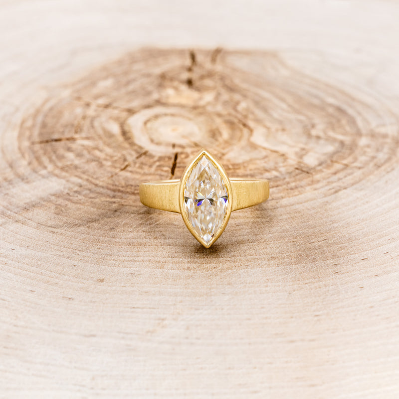 "SADIE" - SOLITAIRE BEZEL SET MARQUISE MOISSANITE ENGAGEMENT RING WITH A SATIN FINISH