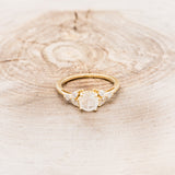 "BLOSSOM" - ROUND CUT MOONSTONE ENGAGEMENT RING WITH LEAF SHAPED DIAMOND ACCENTS