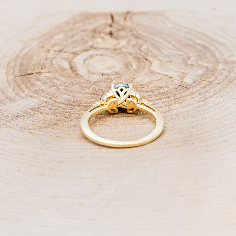 "BLOSSOM" - ROUND CUT TURQUOISE ENGAGEMENT RING WITH LEAF-SHAPED DIAMOND ACCENTS