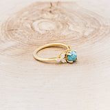"BLOSSOM" - ROUND CUT TURQUOISE ENGAGEMENT RING WITH LEAF-SHAPED DIAMOND ACCENTS