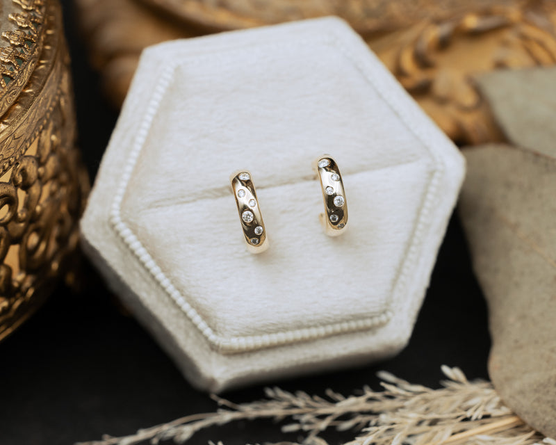 1/10 CTW NATURAL DIAMOND HUGGIE EARRINGS-1