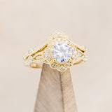 "EILEEN" - ROUND CUT MOISSANITE ENGAGEMENT RING WITH DIAMOND ACCENTS & TRACER