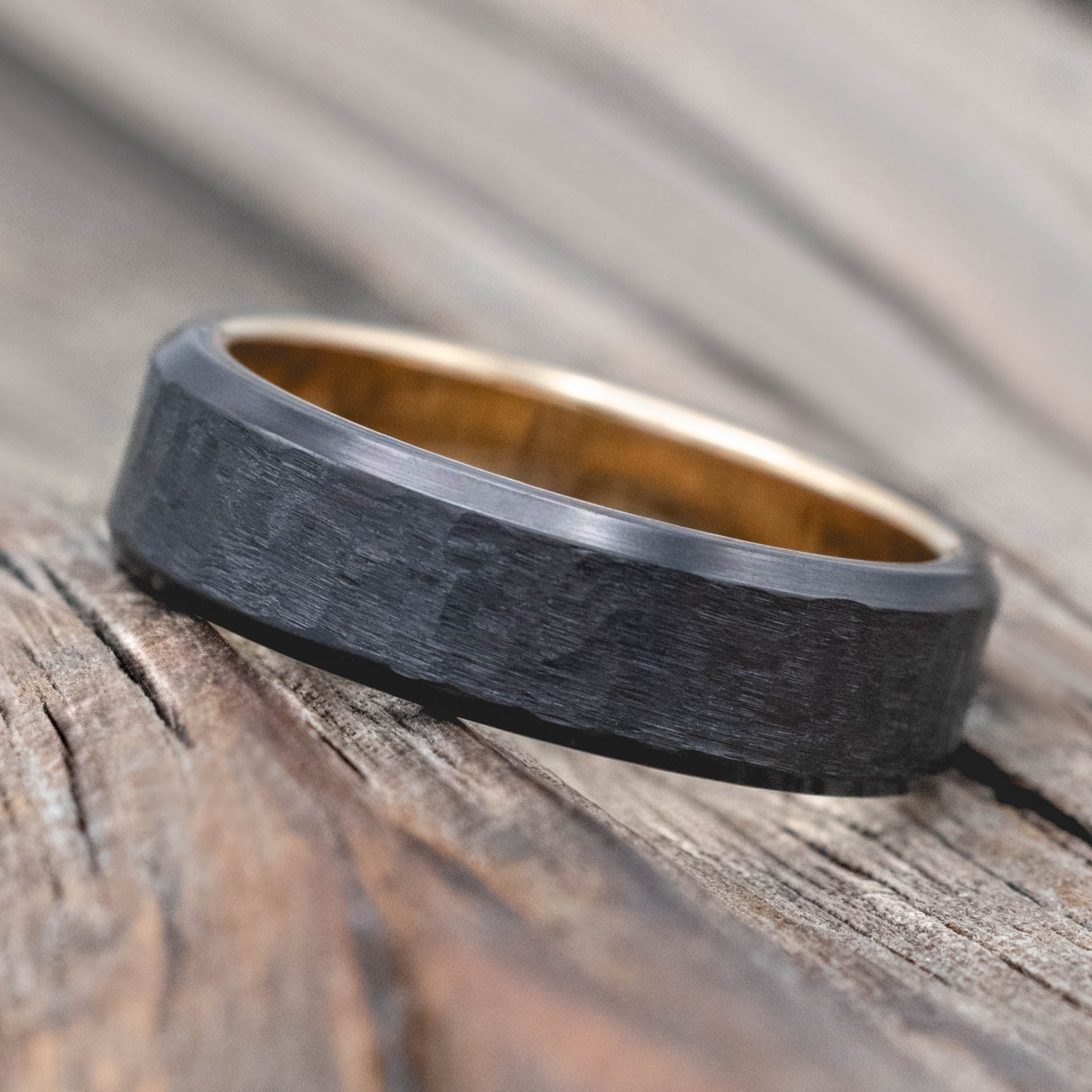 HAMMERED BLACK ZIRCONIUM WEDDING RING WITH A 14K GOLD LINING-Staghead Designs