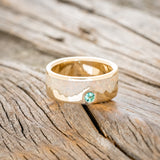 "HELIOS" - FIRE AND ICE OPAL & GOLD MOUNTAIN RANGE WEDDING RING FEATURING A LAB GROWN EMERALD ACCENT