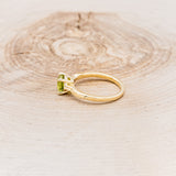 "HOPE" - ROUND CUT PERIDOT SOLITAIRE ENGAGEMENT RING WITH FEATHER ACCENTS-3