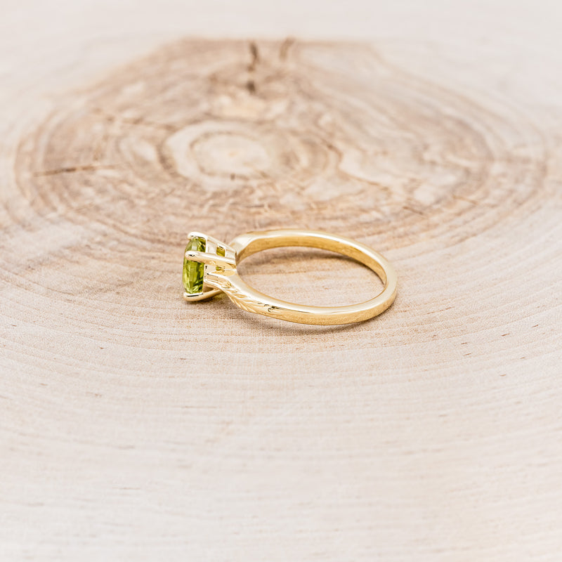 "HOPE" - ROUND CUT PERIDOT SOLITAIRE ENGAGEMENT RING WITH FEATHER ACCENTS