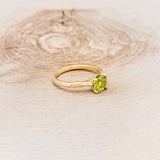 "HOPE" - ROUND CUT PERIDOT SOLITAIRE ENGAGEMENT RING WITH FEATHER ACCENTS