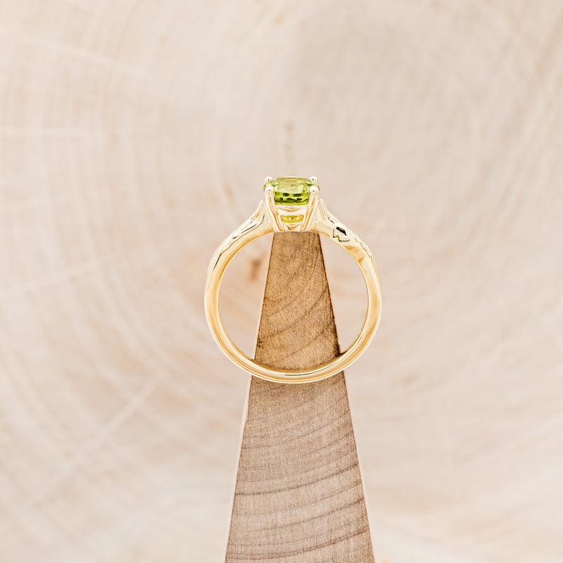 "HOPE" - ROUND CUT PERIDOT SOLITAIRE ENGAGEMENT RING WITH FEATHER ACCENTS