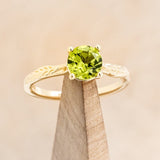 "HOPE" - ROUND CUT PERIDOT SOLITAIRE ENGAGEMENT RING WITH FEATHER ACCENTS