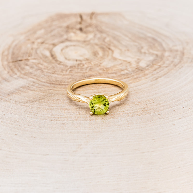 "HOPE" - ROUND CUT PERIDOT SOLITAIRE ENGAGEMENT RING WITH FEATHER ACCENTS