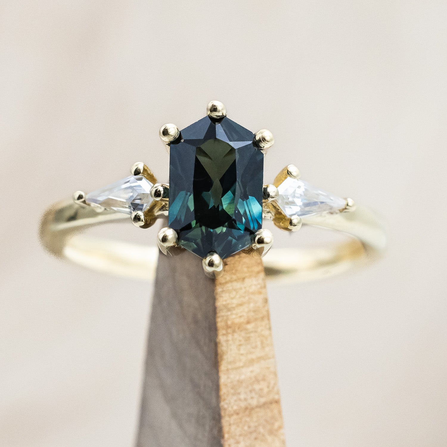 "Isla" - elongated hexagon cut Australian sapphire with moissanite accents in 14K yellow gold